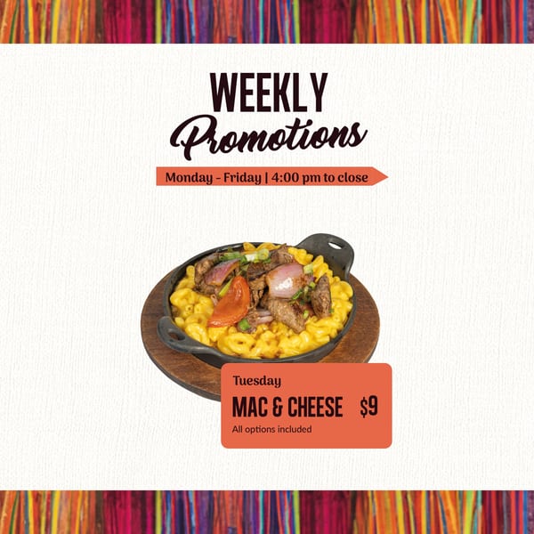 Bocas House's Mac & Cheese with steak, red onions, and peppers in a cast iron skillet.