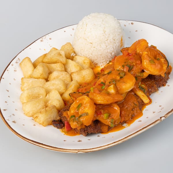 Bocas House's Latin-American dish with shrimp in red sauce, white rice, and fried yuca.